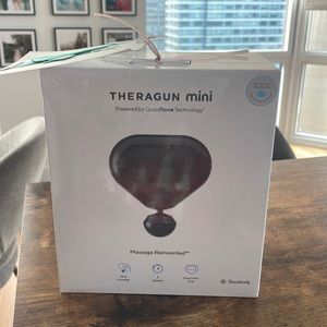new theragun mini sealed in box!